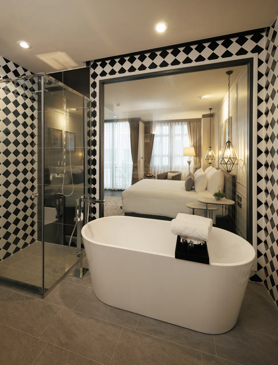 Stylish Deluxe Room with a king bed at our boutique luxury hotel in Chiang Mai.